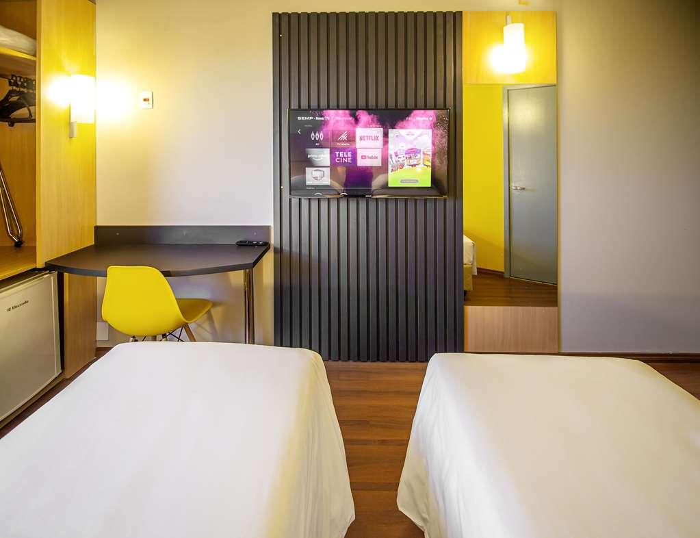HUS HOTEL Dourados Habitación foto